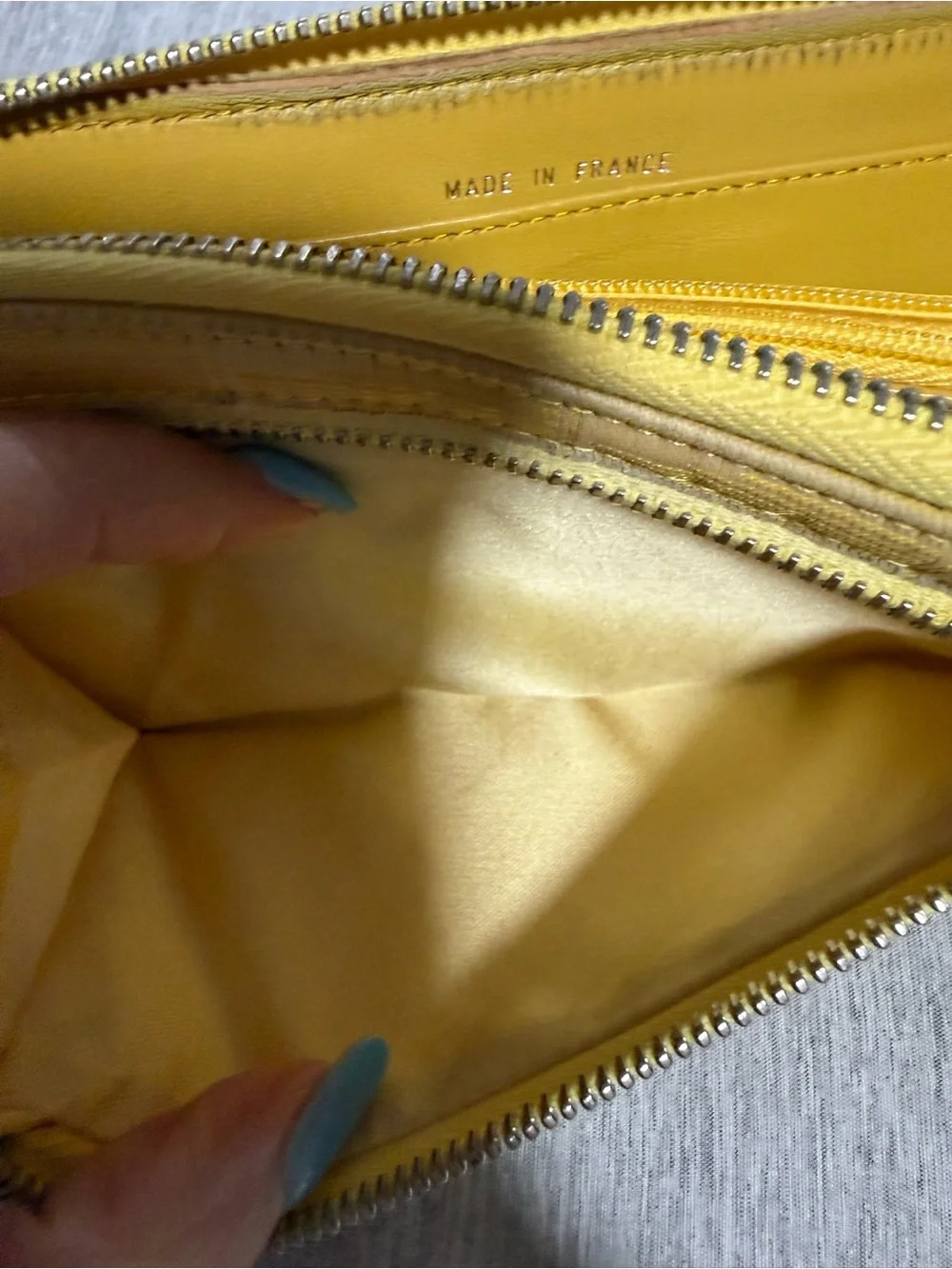 CHANEL Yellow Quilted Zip Around Wallet